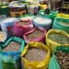 Sacks of dried legumes at a market